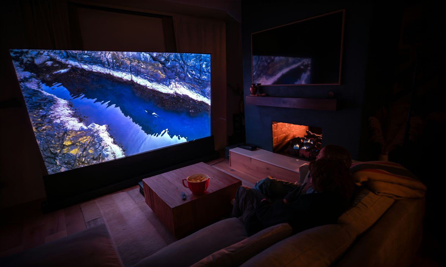 man checking his phone while walking down the stairs