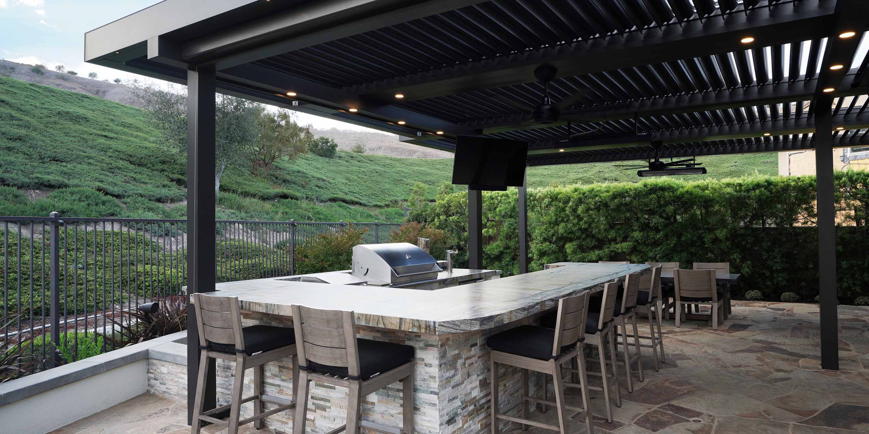 outdoor kitchen with sonance technology and lighting