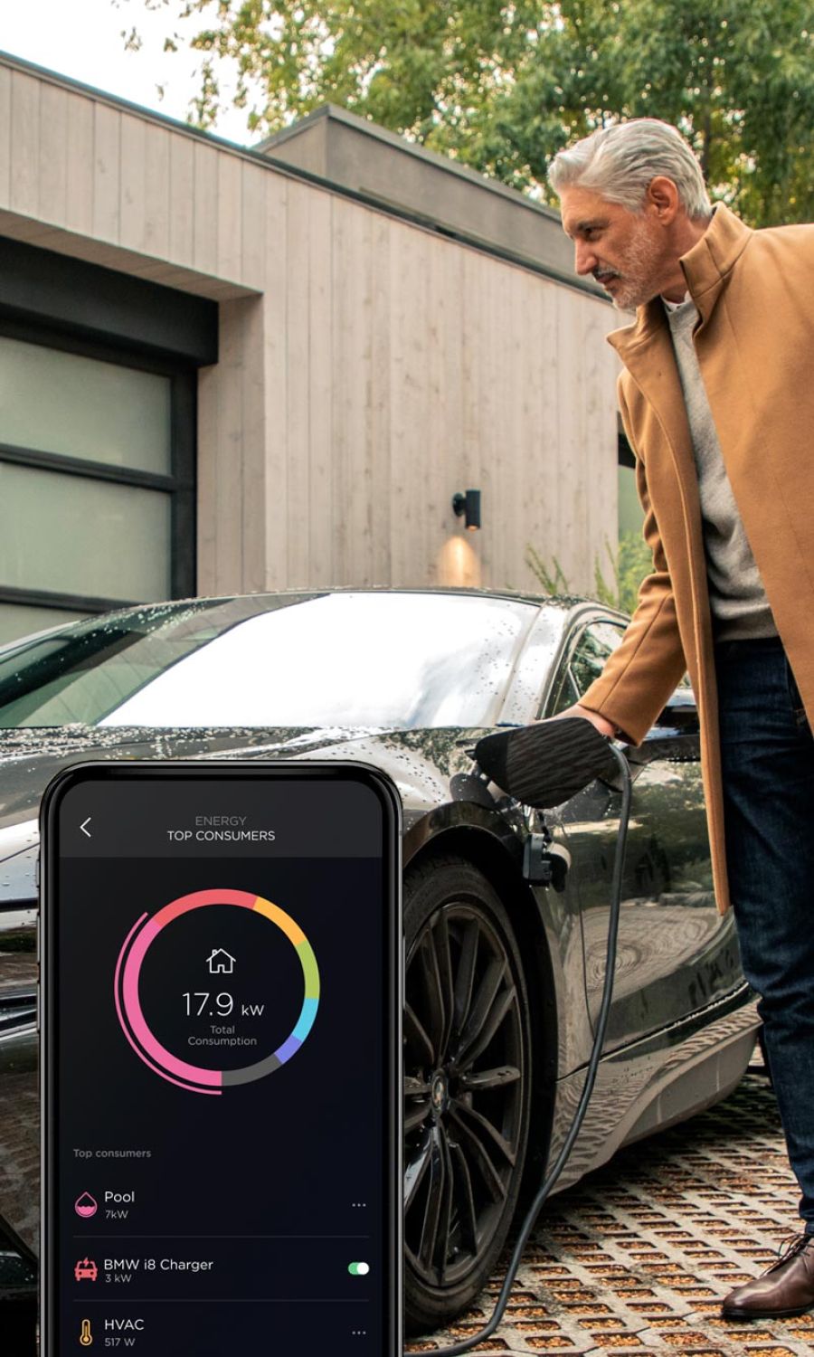 Man charging his car with Savant Power statistics on a phone interface